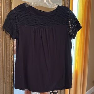Great style navy blue top with crochet lace trim